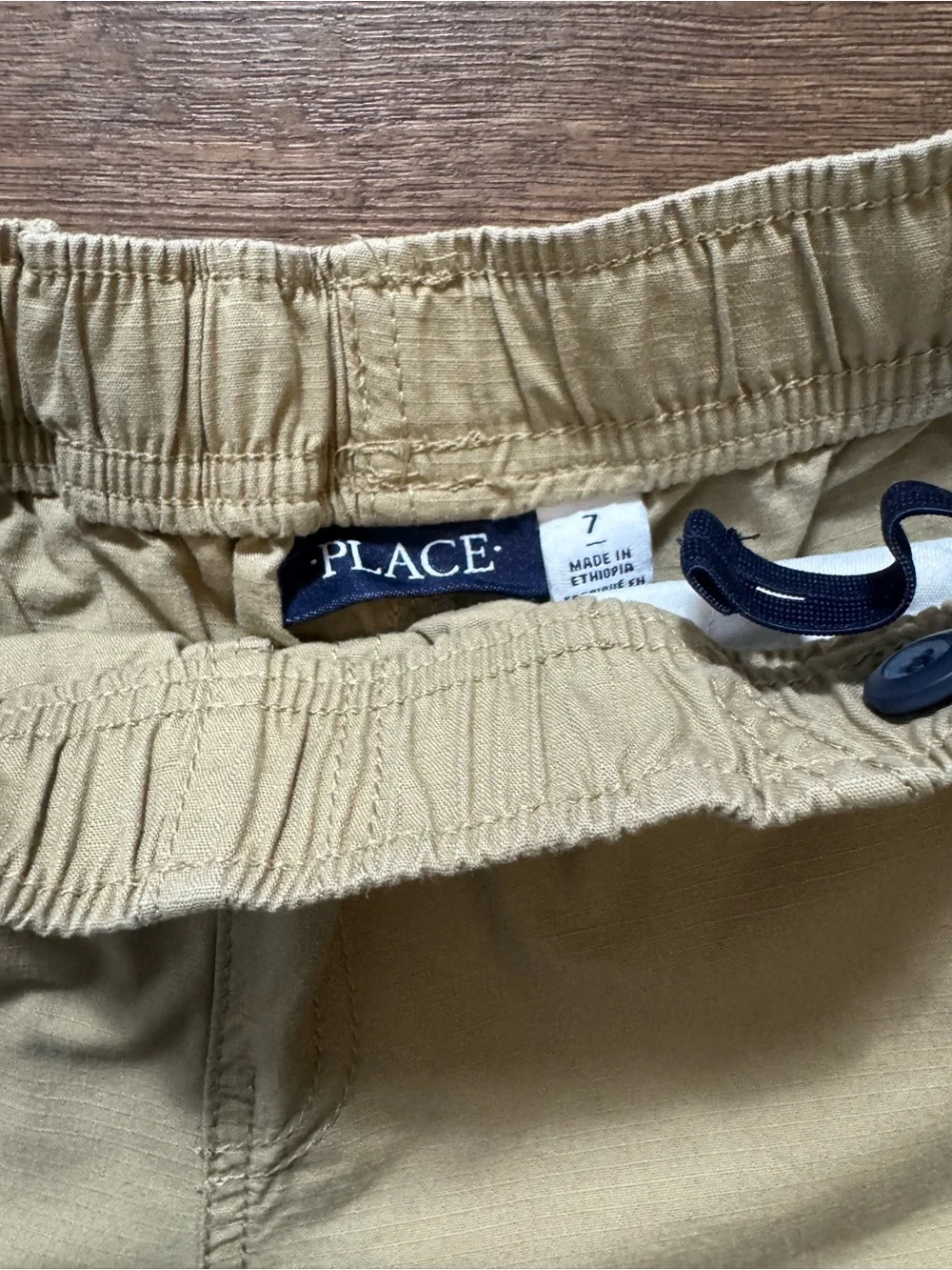 The Children’s Place Boys Cargo Shorts Trio - Navy, Khaki, Tan.
